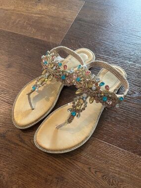 Embellished Gold T-Strap Women's Sandals with Multicolor Gem Accents